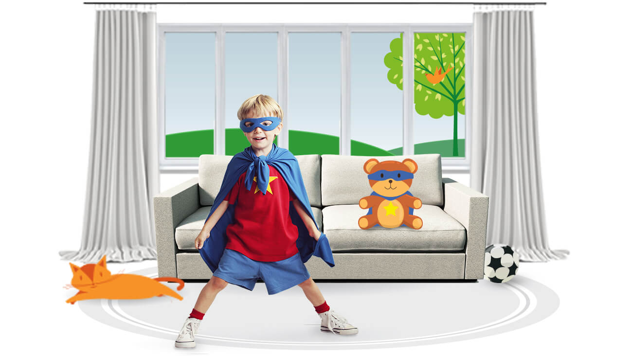 Boy wearing a superhero suit indoors.